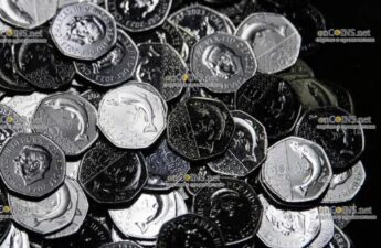 монета номиналом 50 пенсов с изображением атлантического лосося