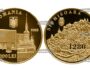 Золотая монета 100 леев Румынии Сигишоара